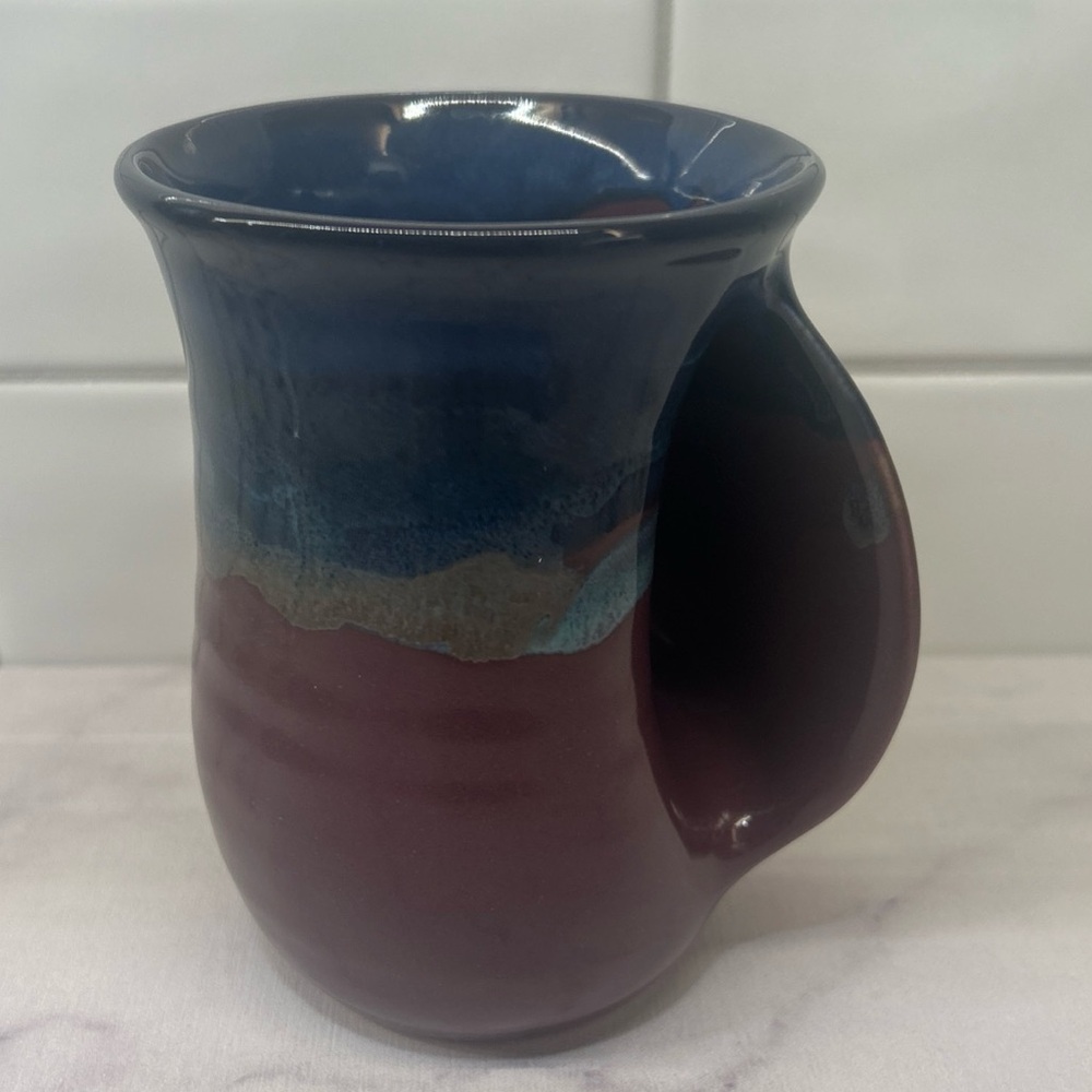 Clay in Motion NEHER 2016 Right Hand Warmer Mug Purple Passion Drip Glaze Blue